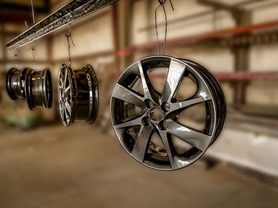 Aluminum Rims hanging after being powder coated